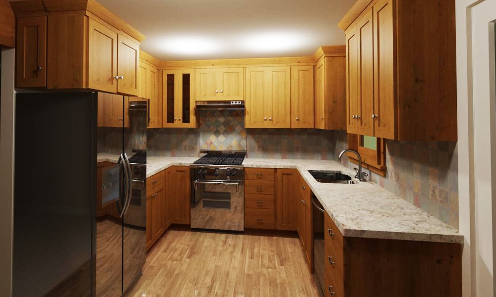U-shaped kitchen with framed knotty wood cabinets and stainless steel appliances.