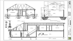 A page from a set of blue-prints with section views showing framing details and construction information.