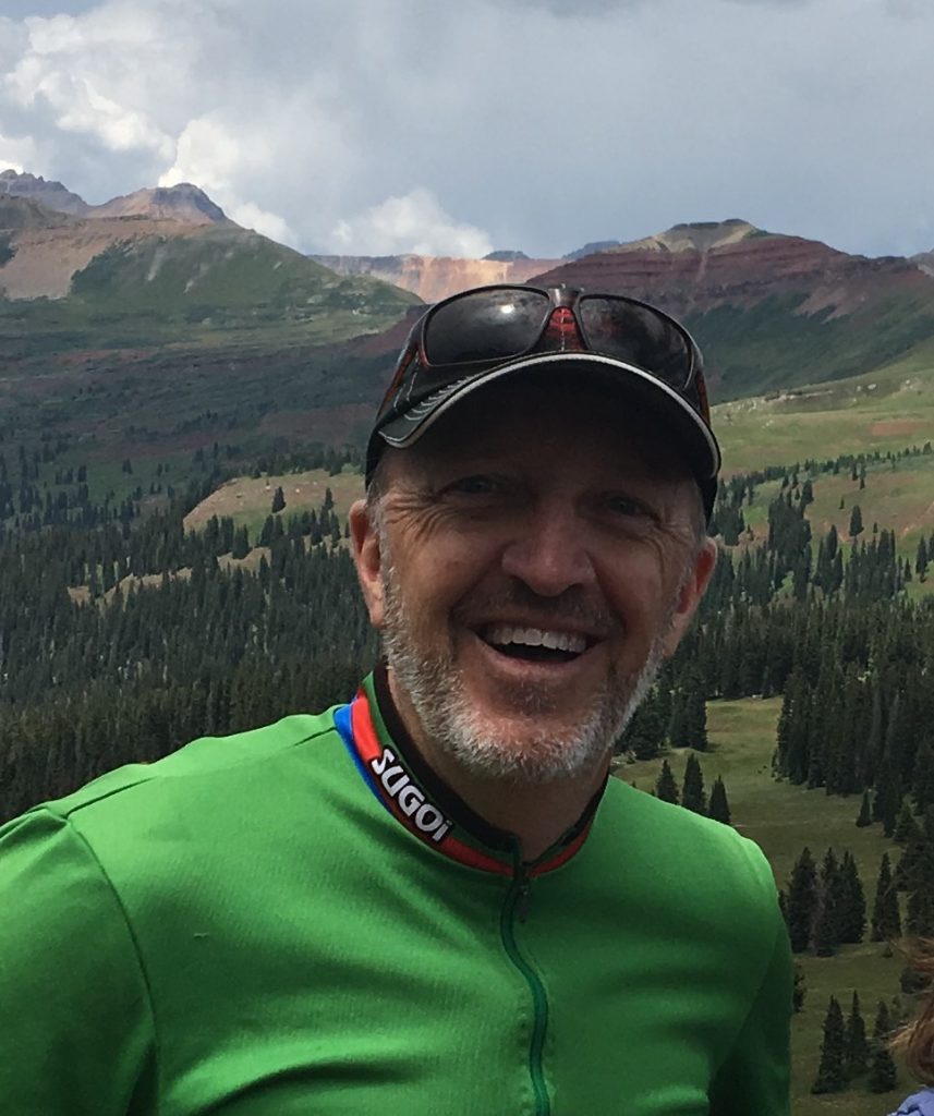 Todd Wilderman hiking in the mountains.