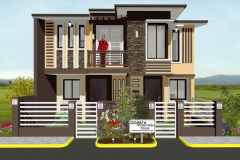 Two-story residential home in the Philippines with  tan siding and brick accents.